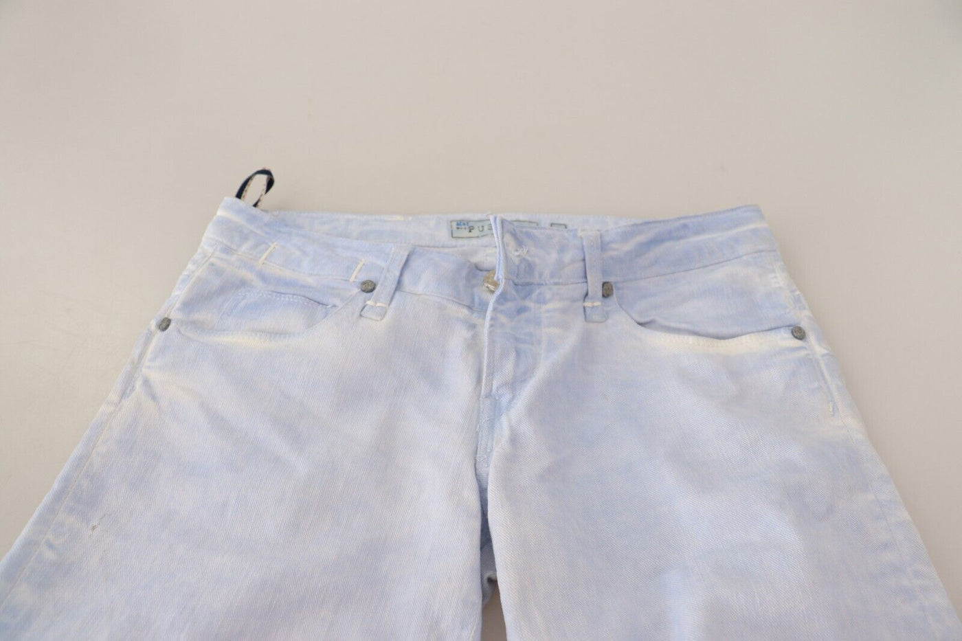 Jean skinny bleu clair en coton à ourlet replié pour femme