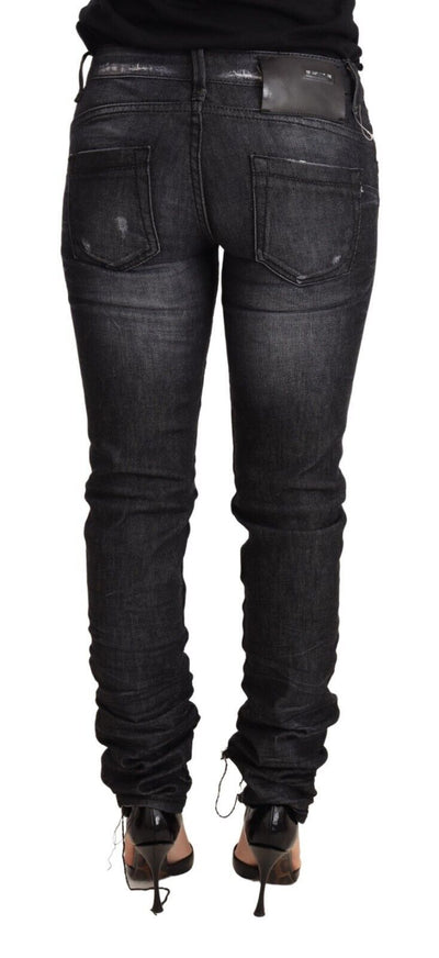 Acht Zwarte Gewassen Katoenen Lage Taille Skinny Denim Broekjeans