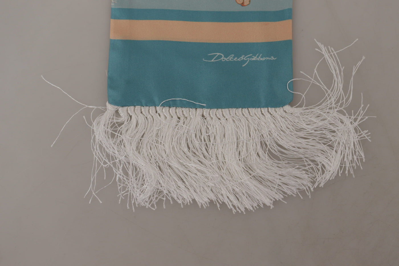 Foulard à franges en soie bleue brillante à imprimé coquillage Dolce &amp; Gabbana