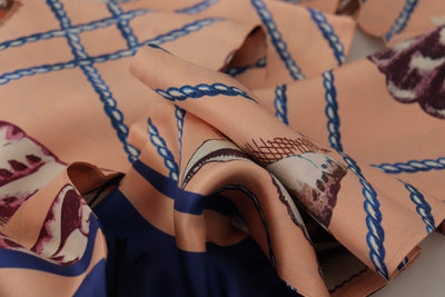 Foulard en soie à franges et châle Dolce &amp; Gabbana à motif coquillage multicolore et logo DG
