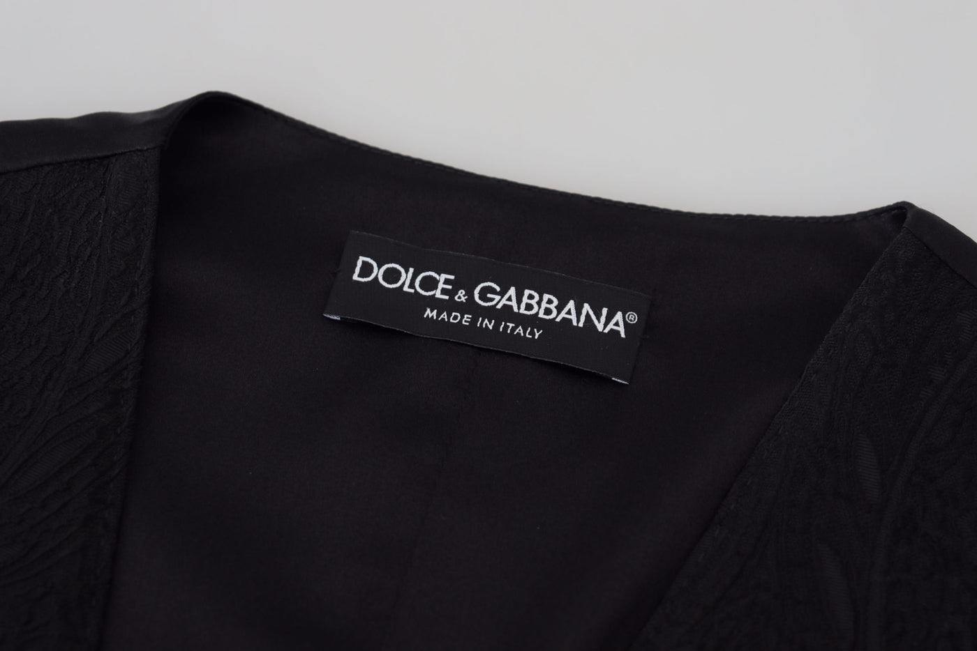 Dolce &amp; Gabbana Débardeur sans manches boutonné en brocart noir