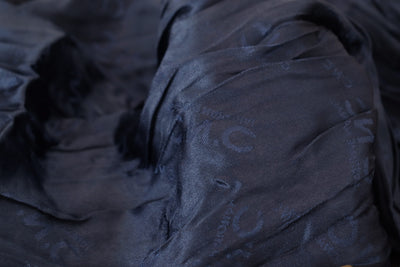 Costume National Châle en soie bleu Foulard à franges