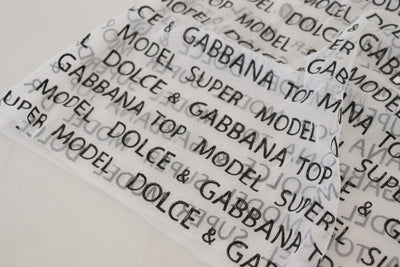 Mini-jupe trapèze transparente à logo blanc Dolce &amp; Gabbana