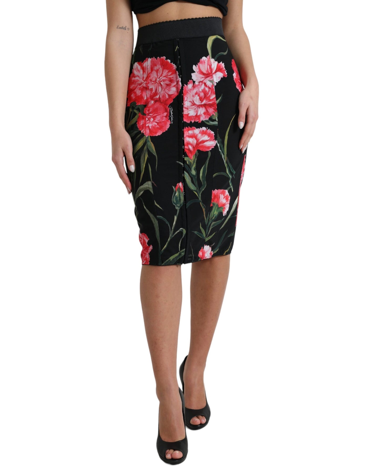 Jupe crayon noire à œillets Dolce &amp; Gabbana, longueur genou