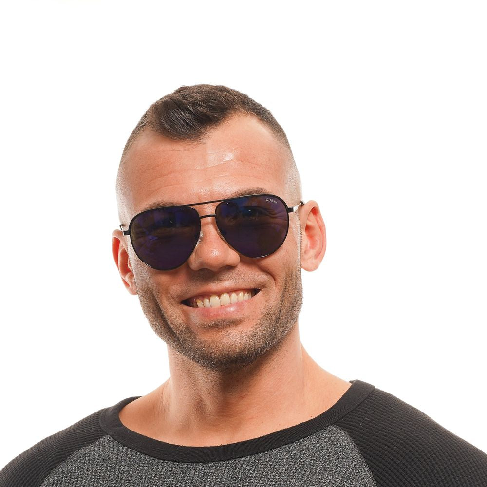 Lunettes de soleil Guess noires pour homme