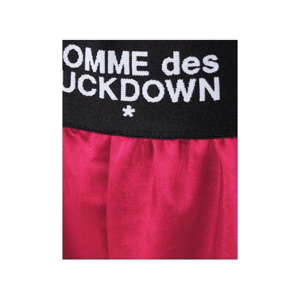 Short en polyester fuchsia Comme des Garçons Fuckdown