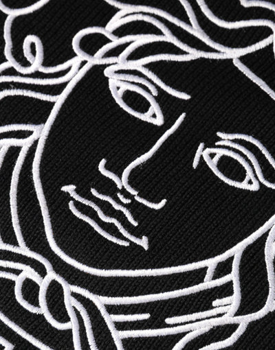 Pull ras du cou noir brodé Medusa de Versace