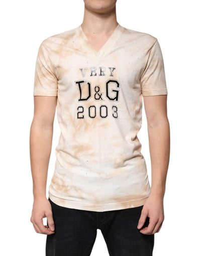 T-shirt col V en coton beige à imprimé graphique Dolce &amp; Gabbana