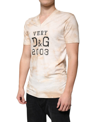 T-shirt col V en coton beige à imprimé graphique Dolce &amp; Gabbana