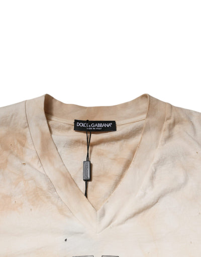 T-shirt col V en coton beige à imprimé graphique Dolce &amp; Gabbana