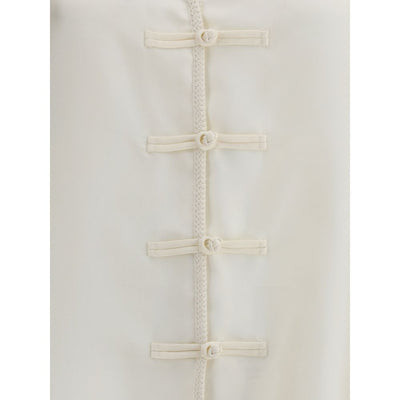 Polo Courrèges avec détail torsadé