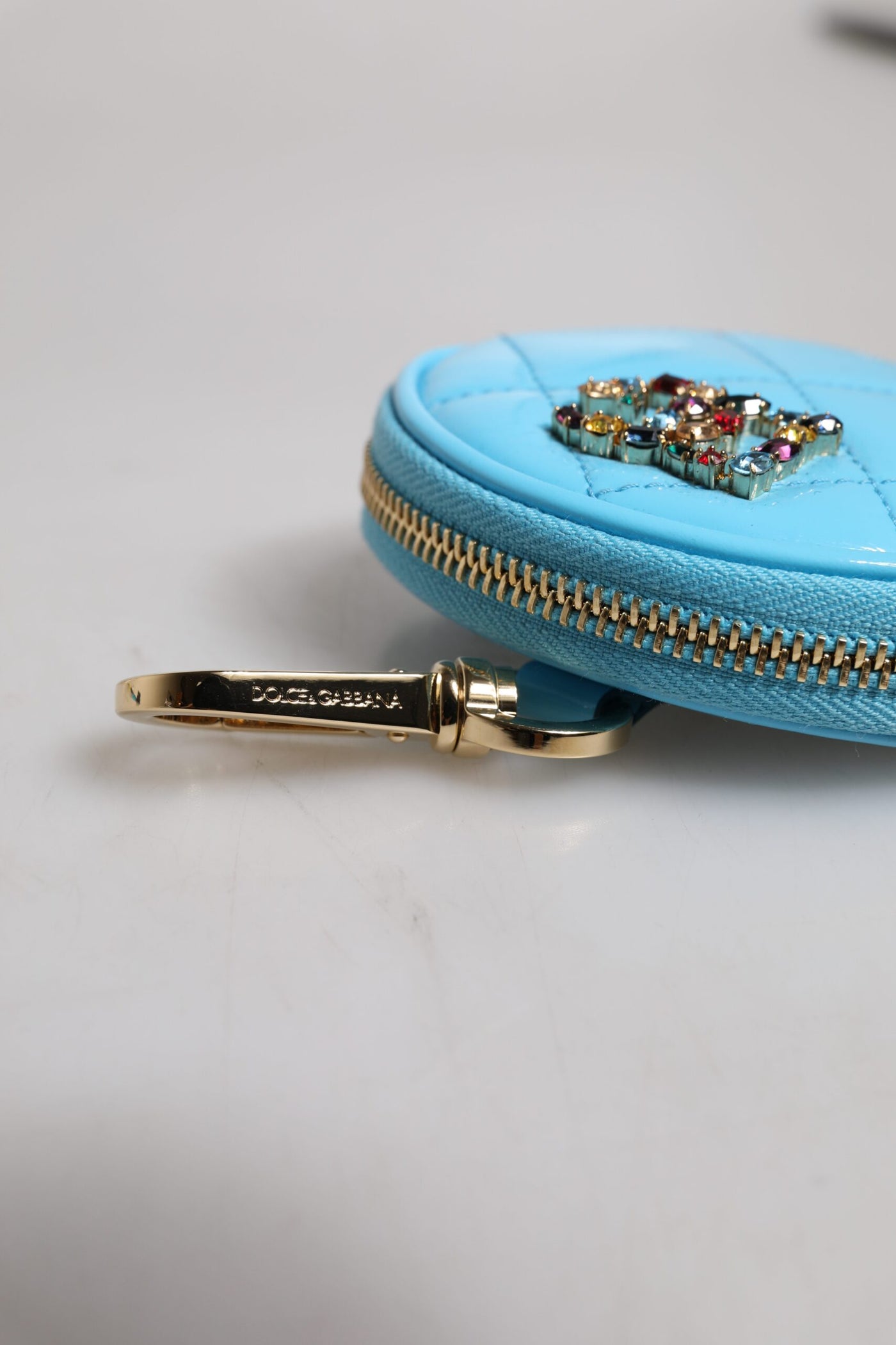 Dolce &amp; Gabbana lichtblauwe DG Crystal ronde portemonnee van lamsleer