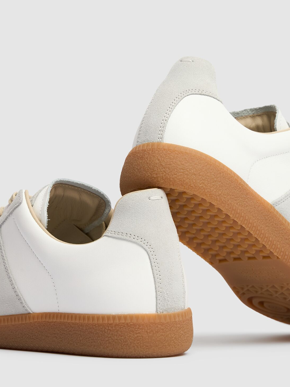 Maison Margiela lage sneakers van leer en suède