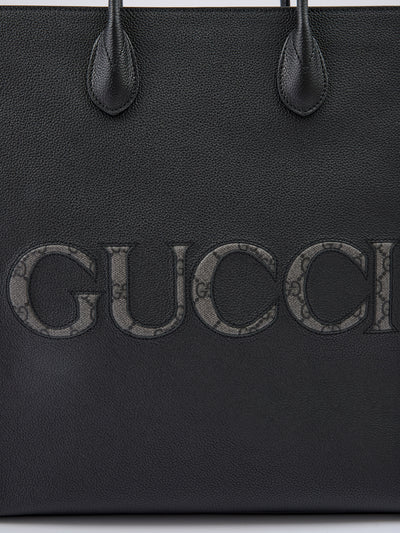 Sac fourre-tout moyen en cuir noir avec logo Gucci
