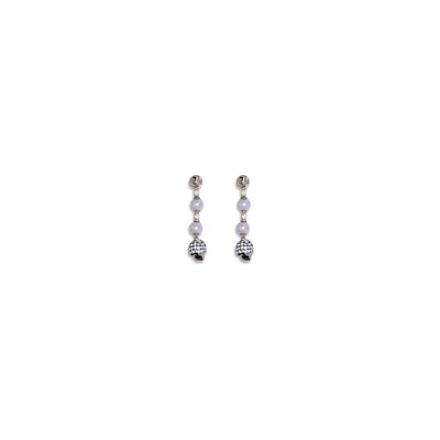 Boucles d'oreilles pendantes tête de mort Alexander McQueen