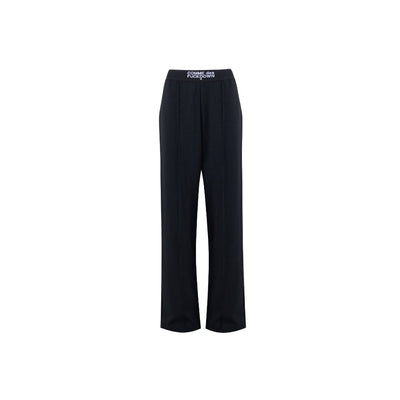 Comme Des Fuckdown Jeans et pantalon en polyester noir