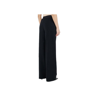 Comme Des Fuckdown Jeans et pantalon en polyester noir