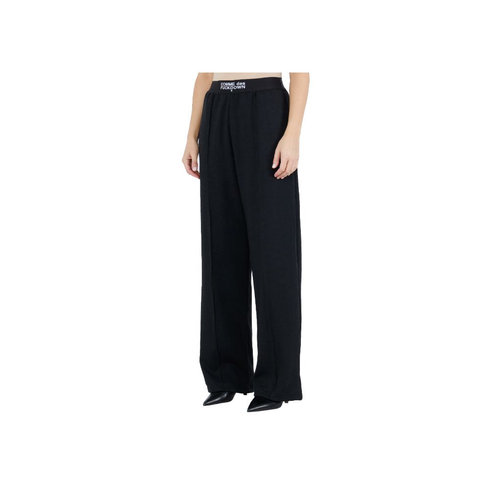 Comme Des Fuckdown Jeans et pantalon en polyester noir