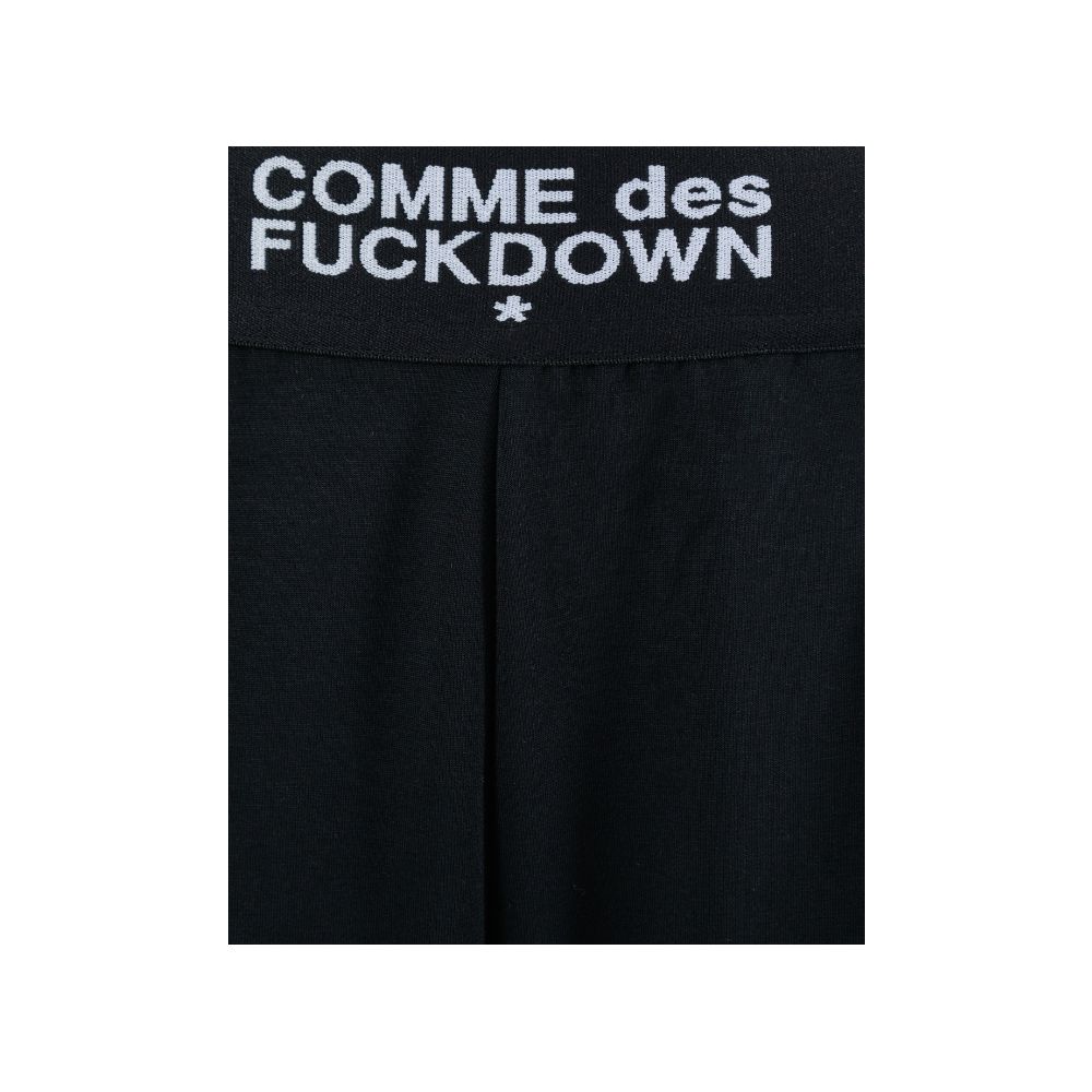 Comme Des Fuckdown Jeans et pantalon en polyester noir