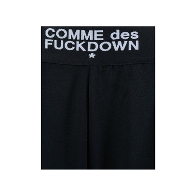 Comme Des Fuckdown Jeans et pantalon en polyester noir