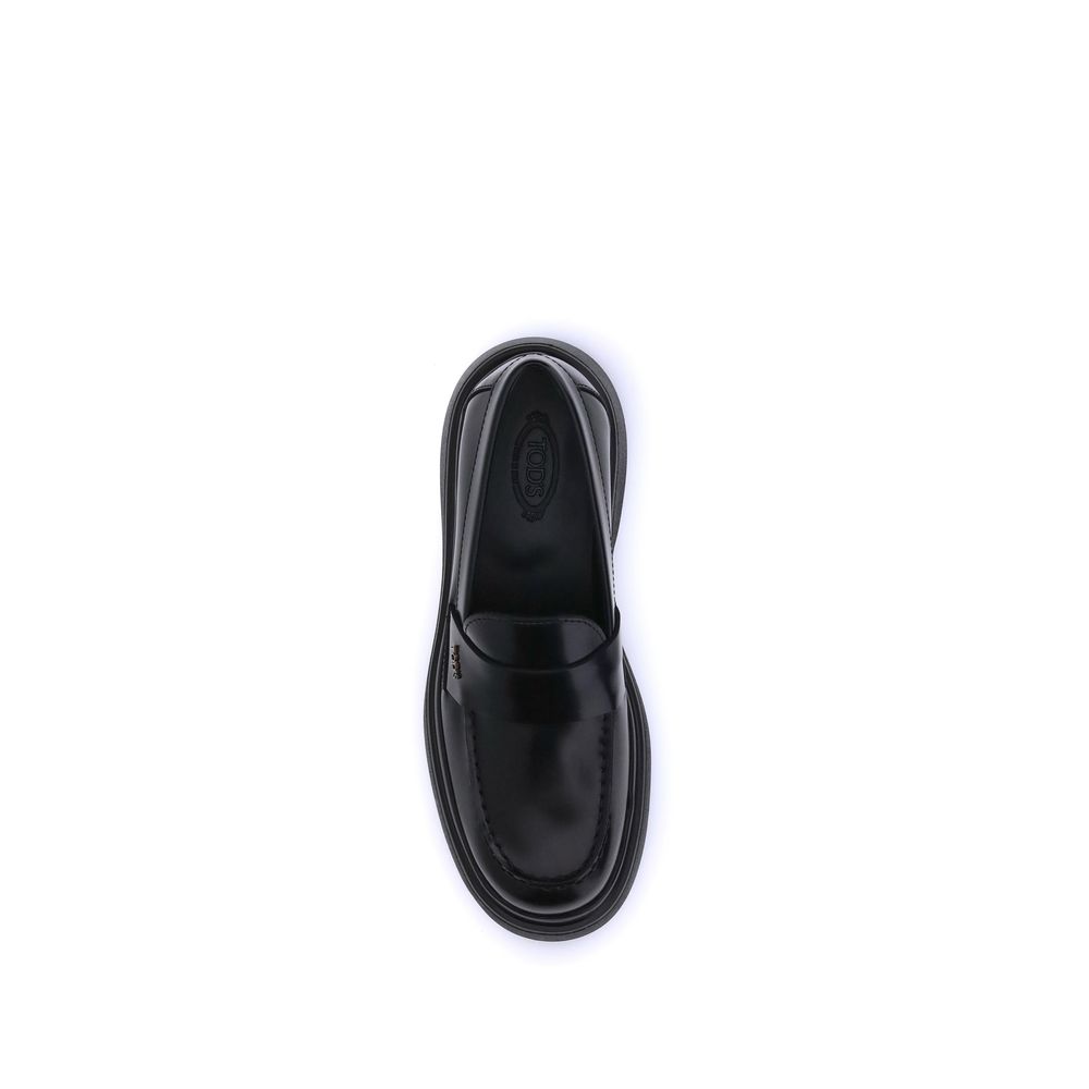 Mocassins en cuir verni Tod's