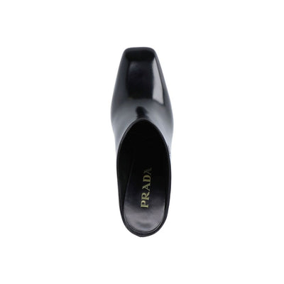 Mules Prada en cuir avec logo