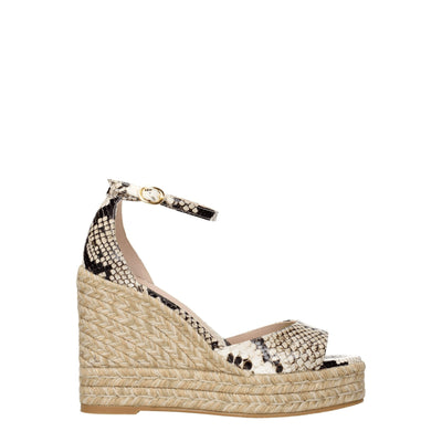 Stuart Weitzman beige leren sandalen met sleehak