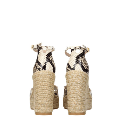 Stuart Weitzman beige leren sandalen met sleehak
