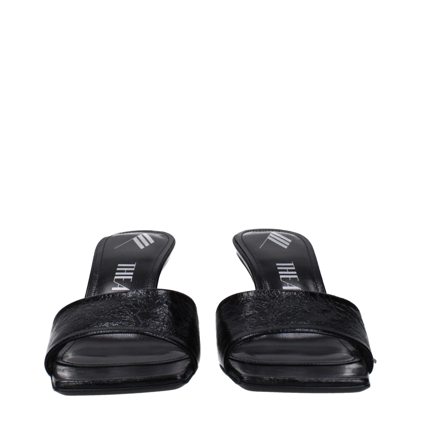 Les sandales plates en cuir noir Attico