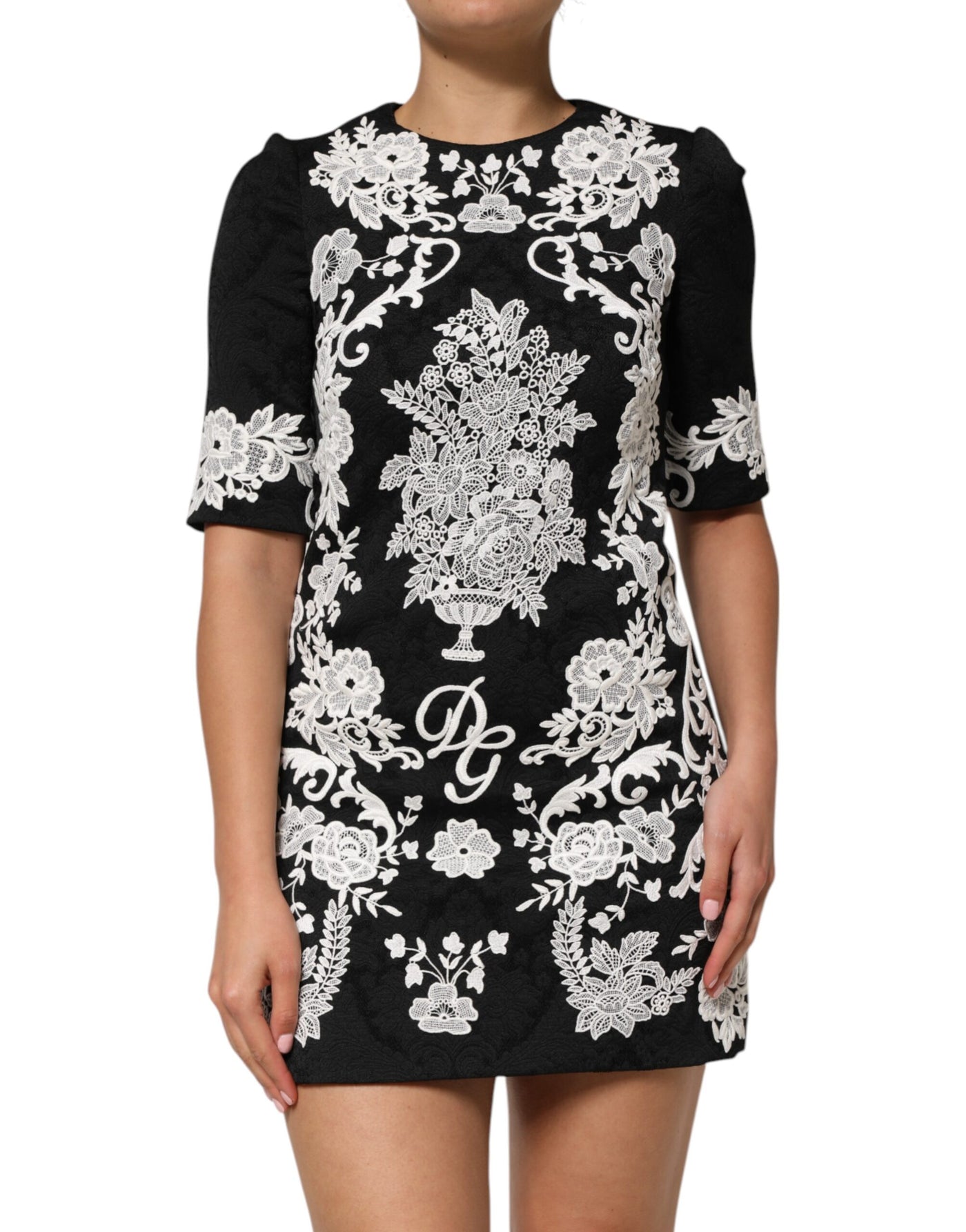 Dolce &amp; Gabbana zwarte A-lijn jurk met kanten rand en korte mouwen
