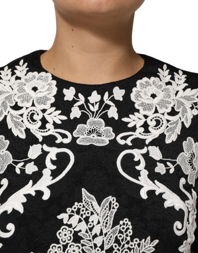 Dolce &amp; Gabbana zwarte A-lijn jurk met kanten rand en korte mouwen