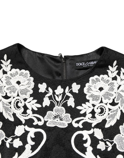 Dolce &amp; Gabbana zwarte A-lijn jurk met kanten rand en korte mouwen