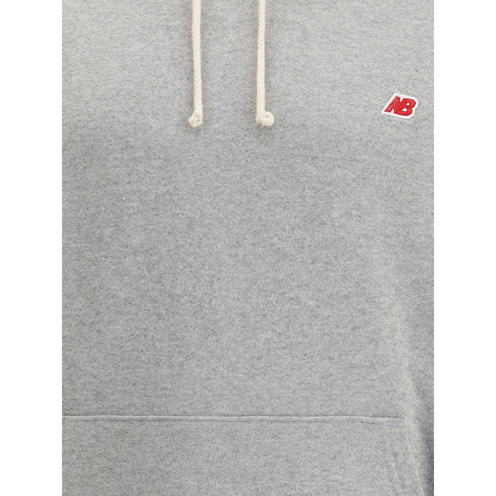 Sweat à capuche New Balance avec mini logo